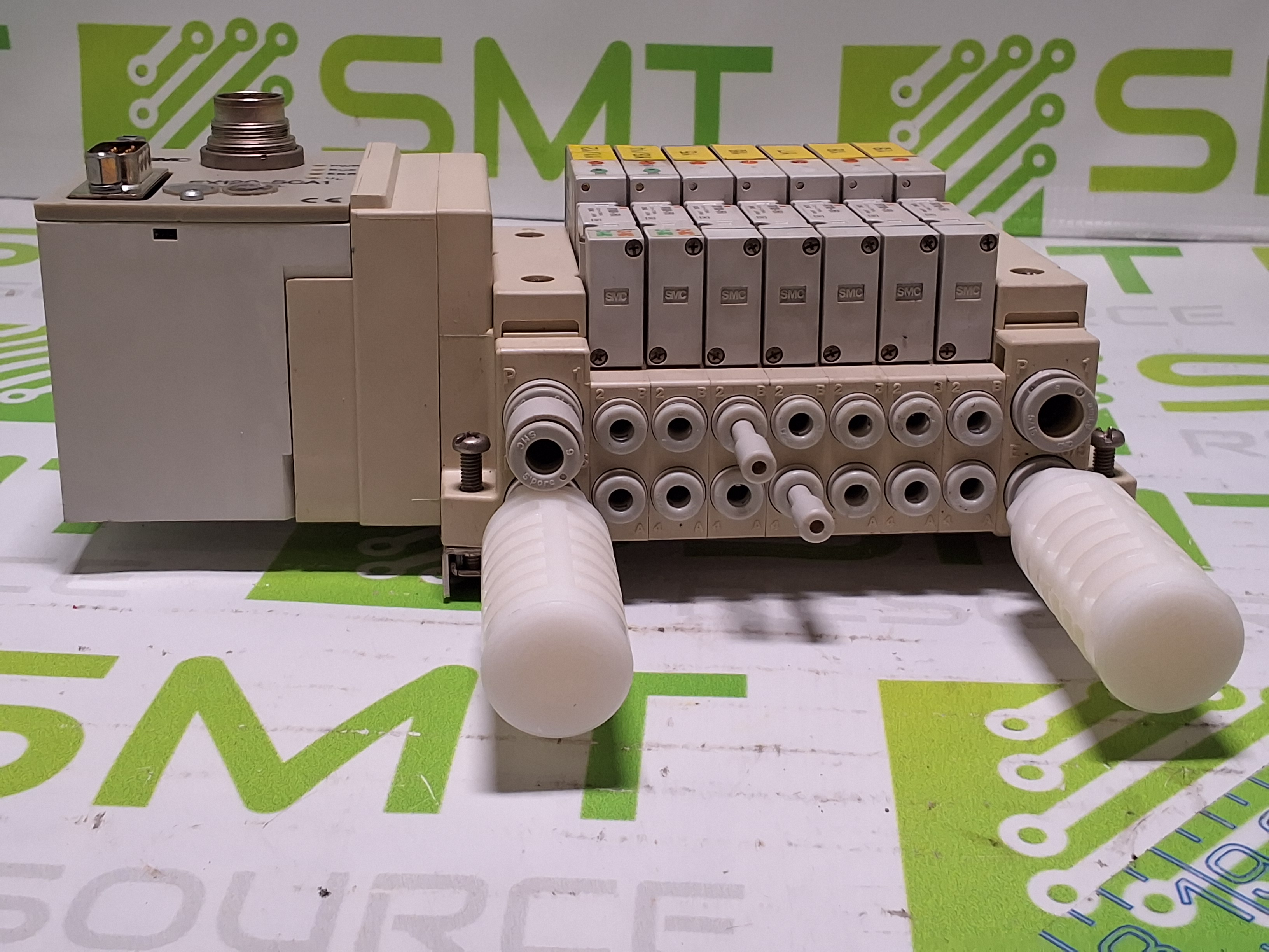 Used SMC EX120-SCA1 CONTROLLER AND 5 PORT MANIFOLD WITH 7 SMC SOLENOID VALVES