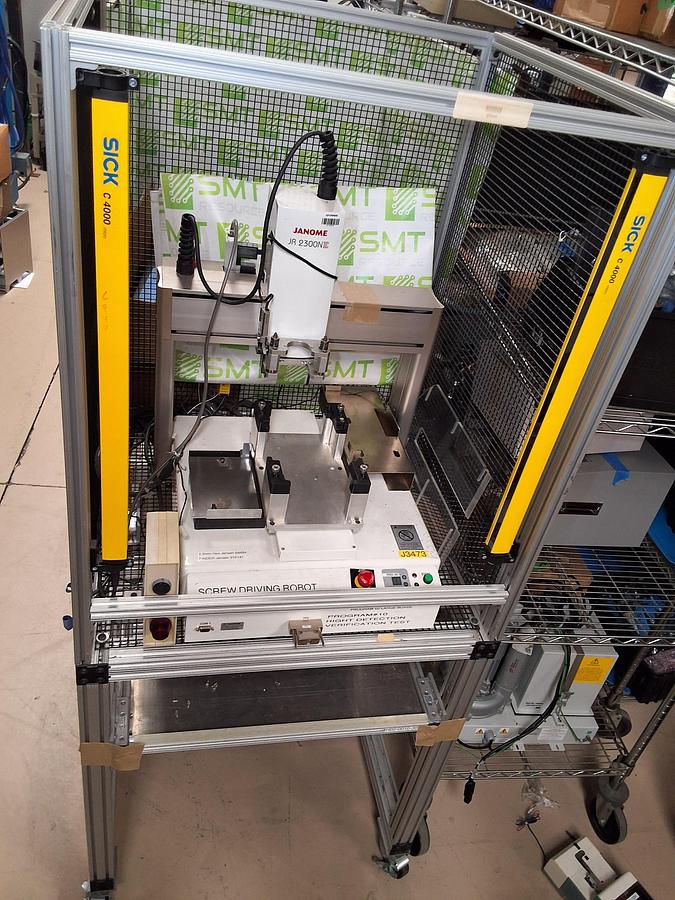 Used JANOME JR 2300NE SCREW DRIVING ROBOT DISPENSING SYSTEM WITH ROLLING CAGE JR2303NE