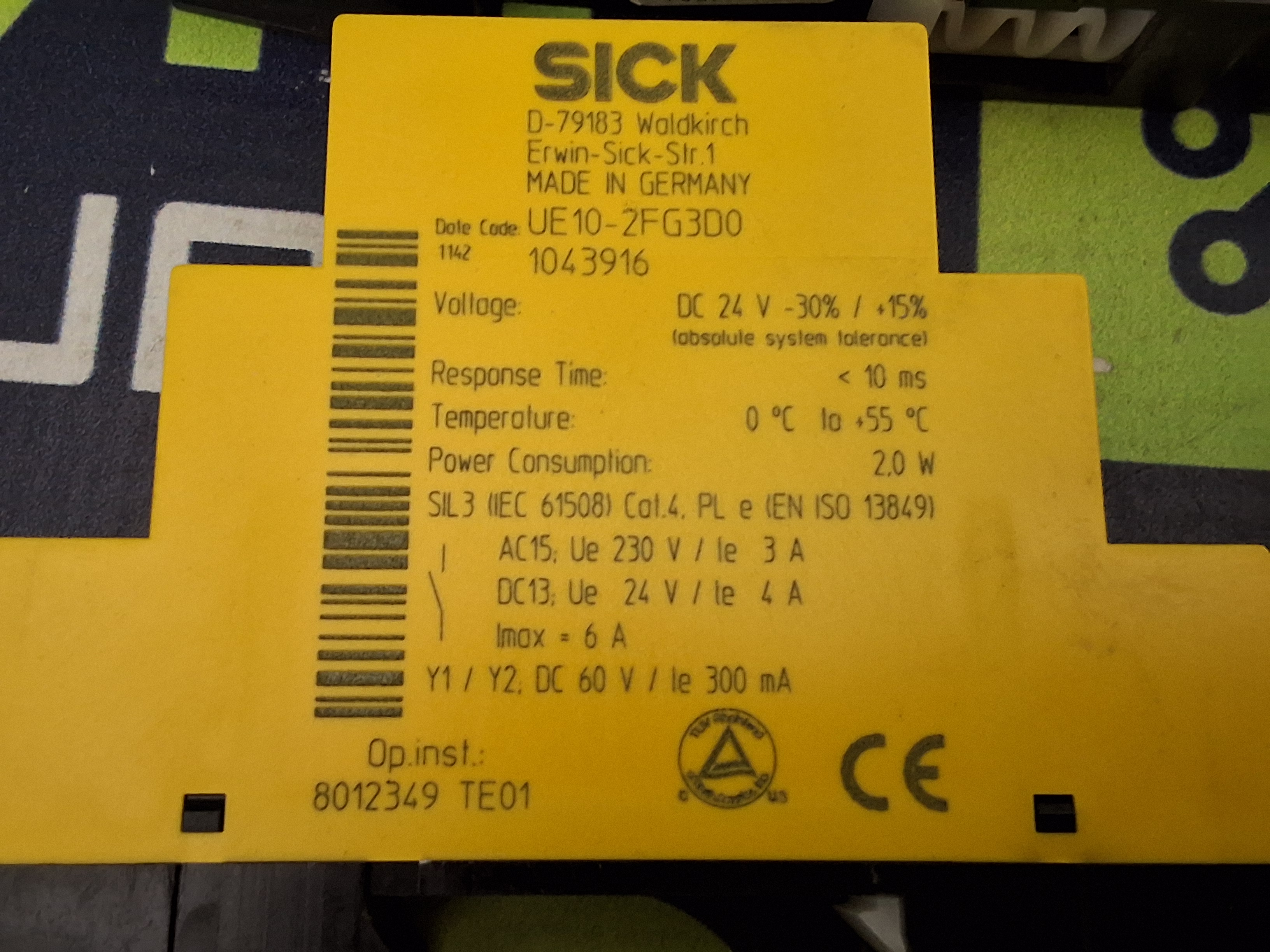 Used SICK 1043916 / UE10-2FG3D0 / UE10-2FG SAFETY RELAY 24V 6A