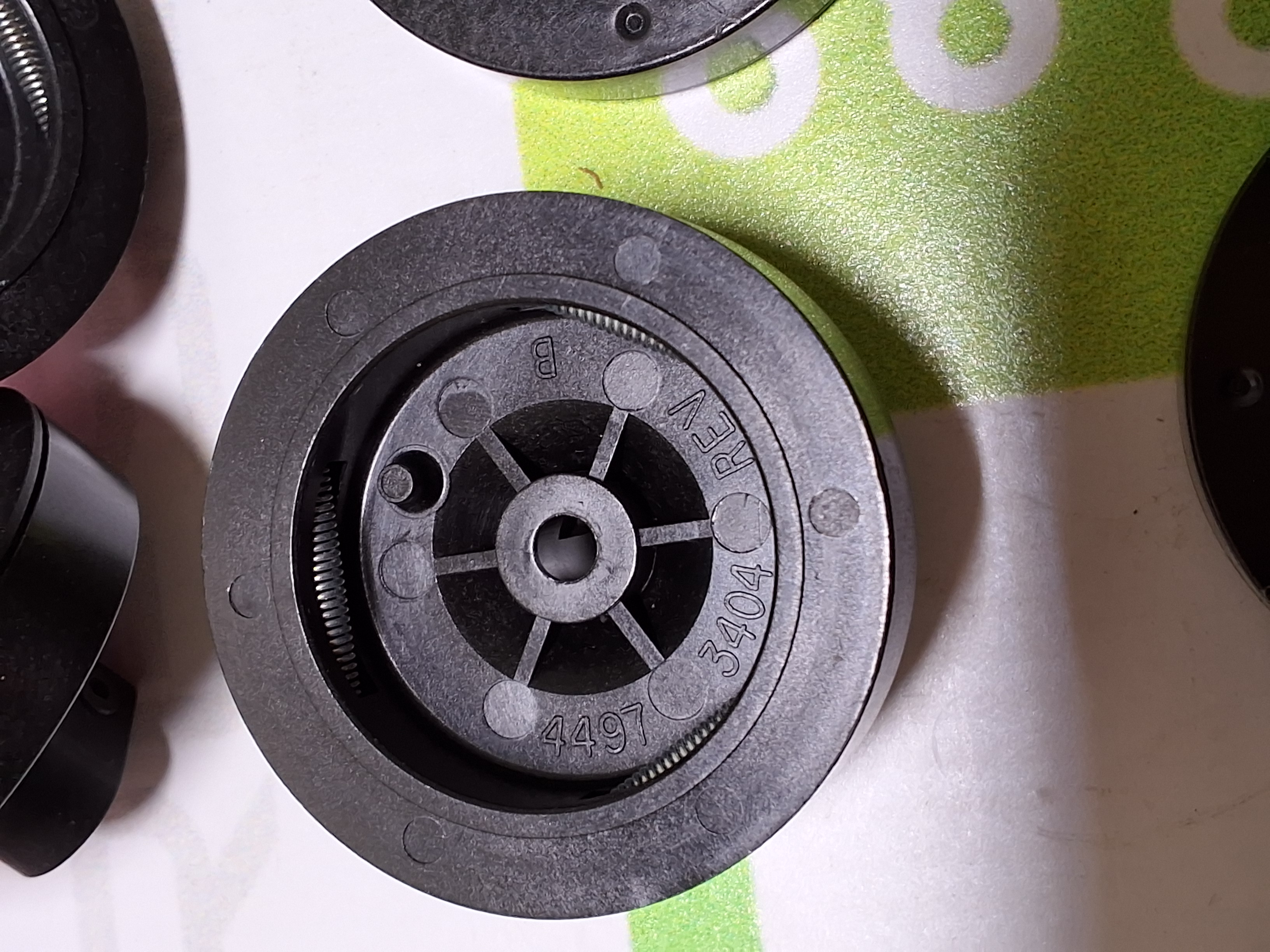 UNIVERSAL INSTRUMENTS 44973405 SPRING ADAPTOR ASSEMBLY 44973404 REV B - BRAND NEW