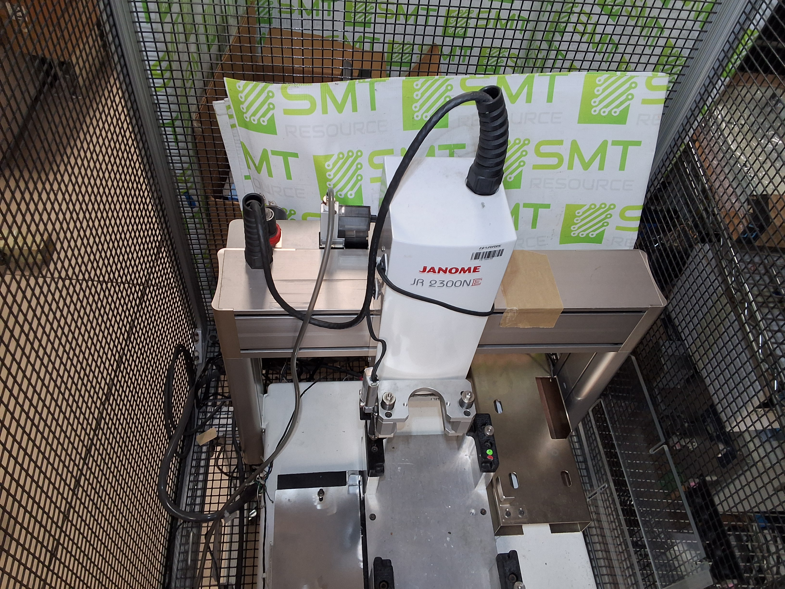 Used JANOME JR 2300NE SCREW DRIVING ROBOT DISPENSING SYSTEM WITH ROLLING CAGE JR2303NE