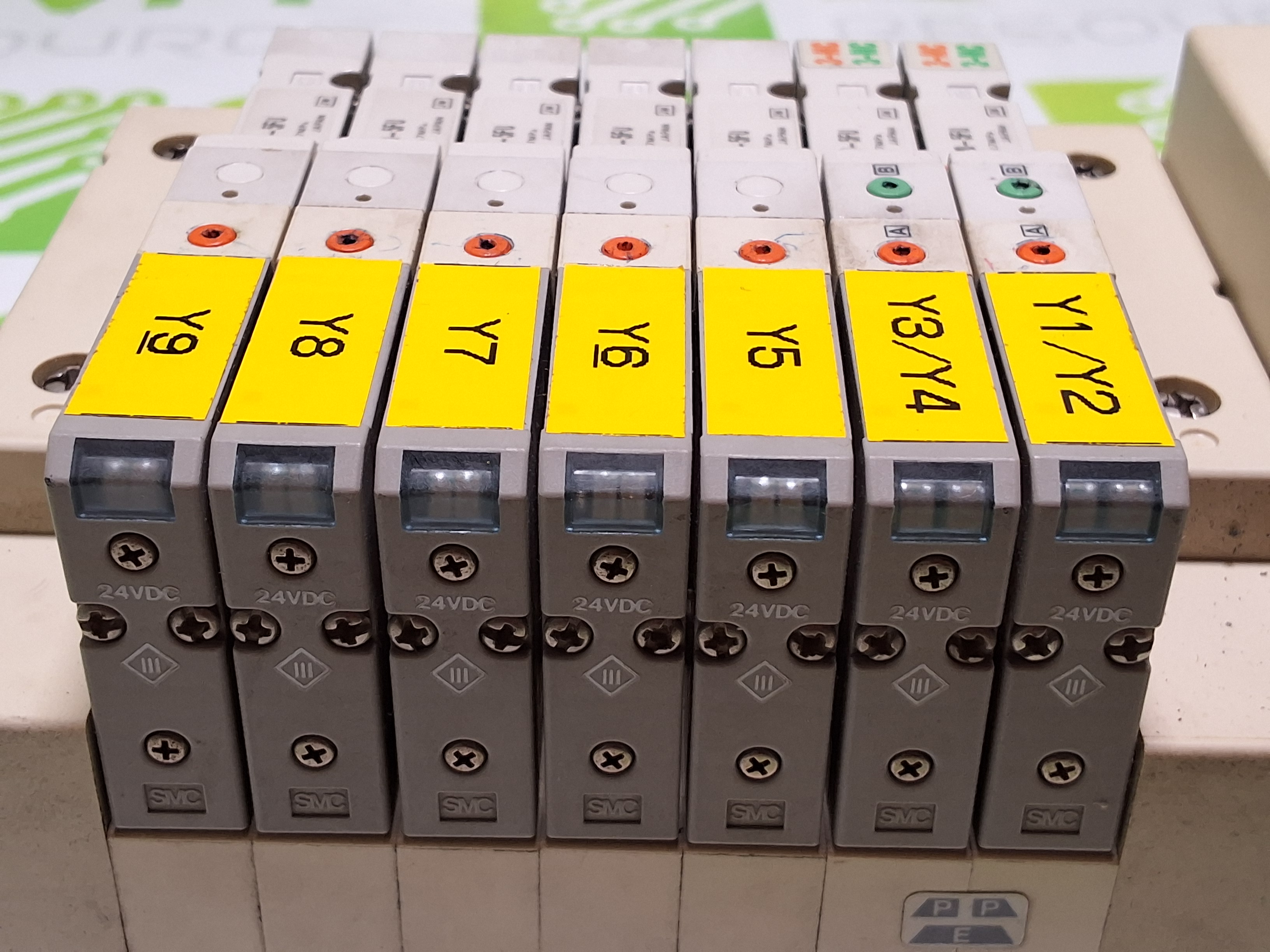 Used SMC EX120-SCA1 CONTROLLER AND 5 PORT MANIFOLD WITH 7 SMC SOLENOID VALVES