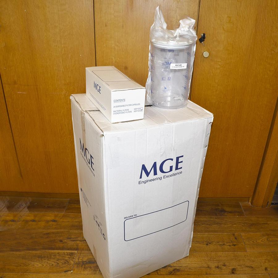 Neuf ASPIRATEUR CHIRURGICAL MGE SAM 35 avec pédale 2 bocaux de 4 litres consommable