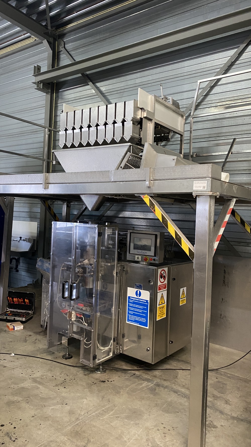 Used Newtec 9 channel weighing line