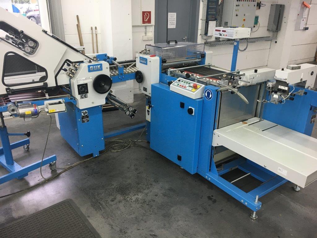 Used GUK SM 502 cutting with feeder 2011