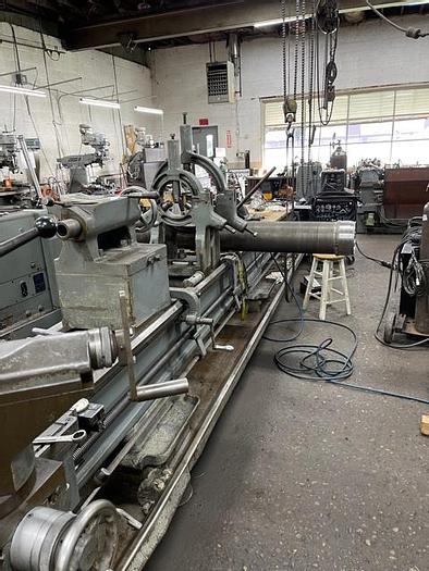 Used 1974 Cincinnati Engine Lathe, Model LR, 36" Swing, 27" Swing over Cross Slide, 216" Between Centers, 640 RPM, (2) Steady Rests, Threading, 24" 4 Jaw Chuck.