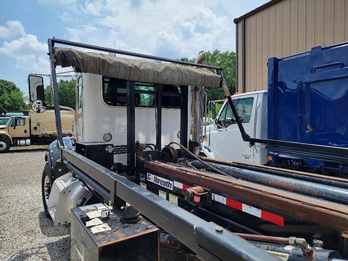 Used 2015 PETERBILT ROLLOFF TRUCK