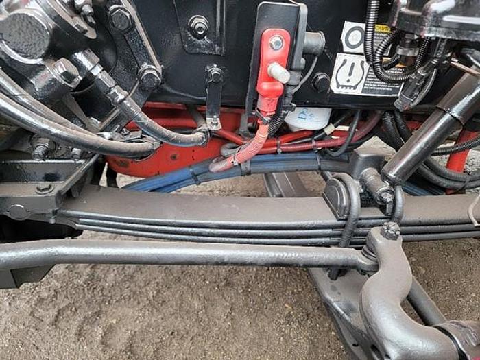 Used "BIG RED" 2015 PETERBILT REAR LOAD TRUCK