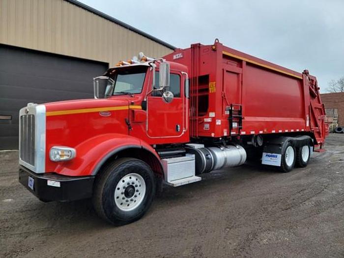 Used "BIG RED" 2015 PETERBILT REAR LOAD TRUCK