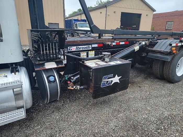 Used 2015 PETERBILT ROLLOFF TRUCK