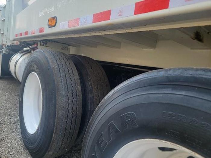 Used 2010 AUTOCAR SIDE LOAD TRUCK