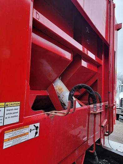 Used "BIG RED" 2015 PETERBILT REAR LOAD TRUCK