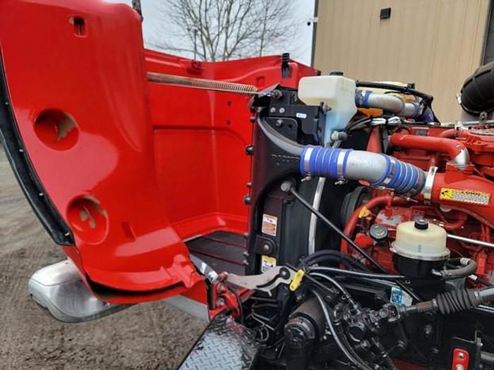 Used "BIG RED" 2015 PETERBILT REAR LOAD TRUCK