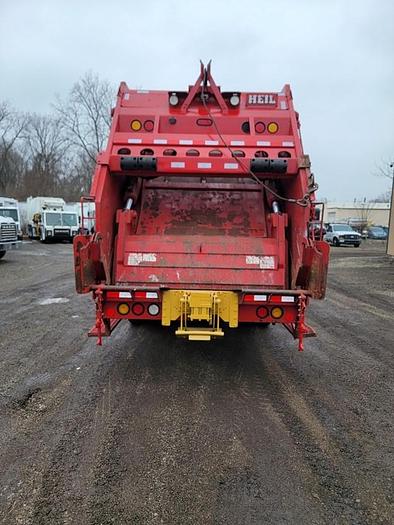 Used "BIG RED" 2015 PETERBILT REAR LOAD TRUCK