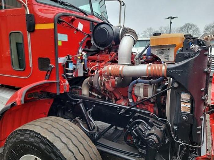 Used "BIG RED" 2015 PETERBILT REAR LOAD TRUCK