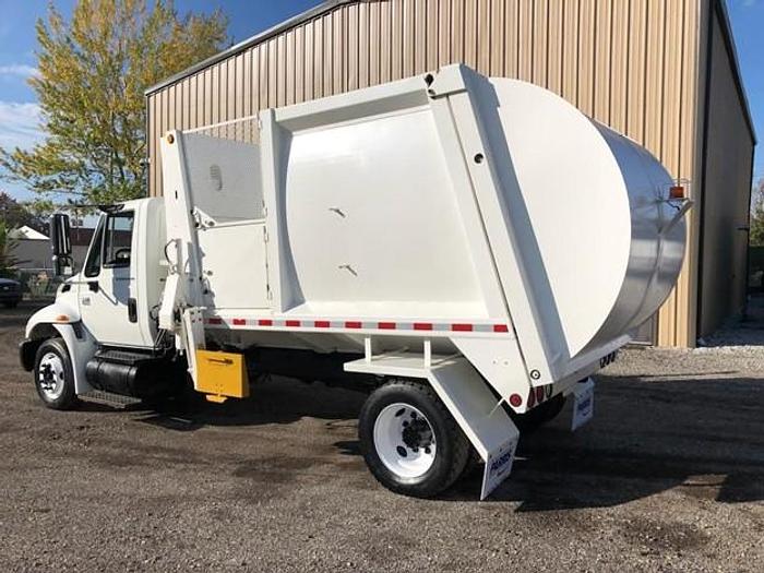 Used 2003 INTERNATIONAL SIDE LOAD TRUCK