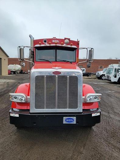 Used "BIG RED" 2015 PETERBILT REAR LOAD TRUCK