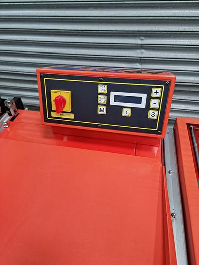 Used Adpak s560 chamber sharing wrap machine