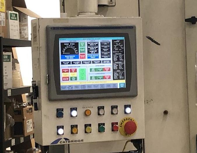Used 59" WIDE CATBRIDGE DUPLEX TURRET SLITTER REWINDER MFG. 2009