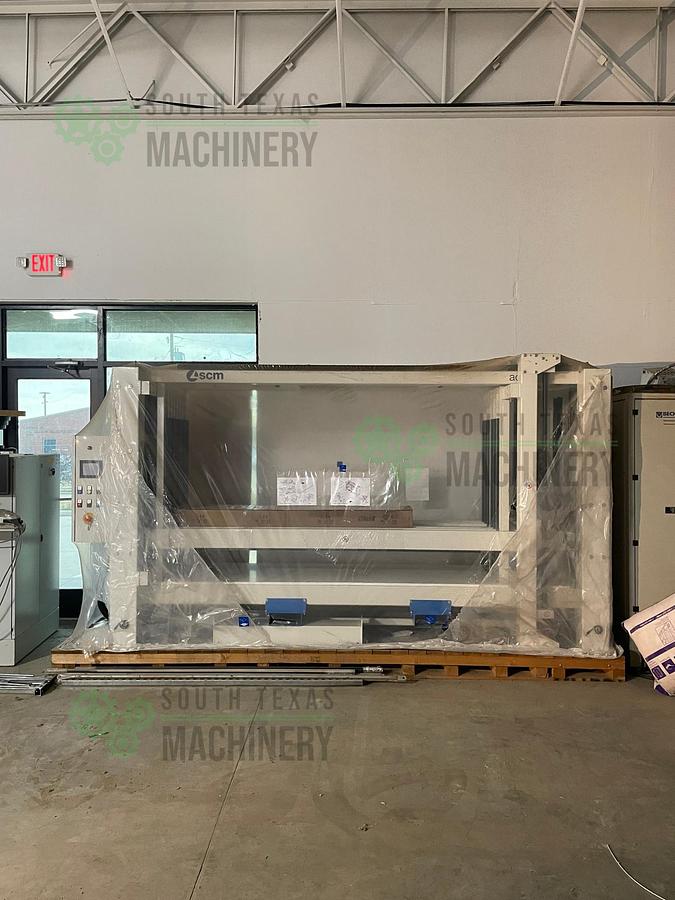 Used SCM Action P Case Clamp