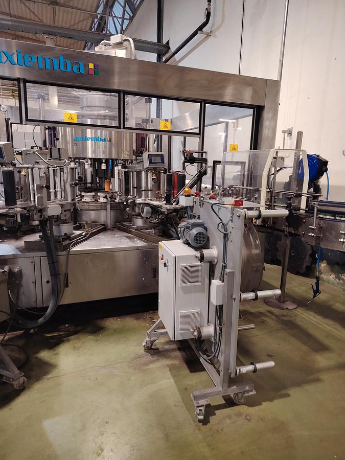 D'occasion Étiqueteuse automatique rotative Auxiemba SERVOTECH ROB 20-II-DR