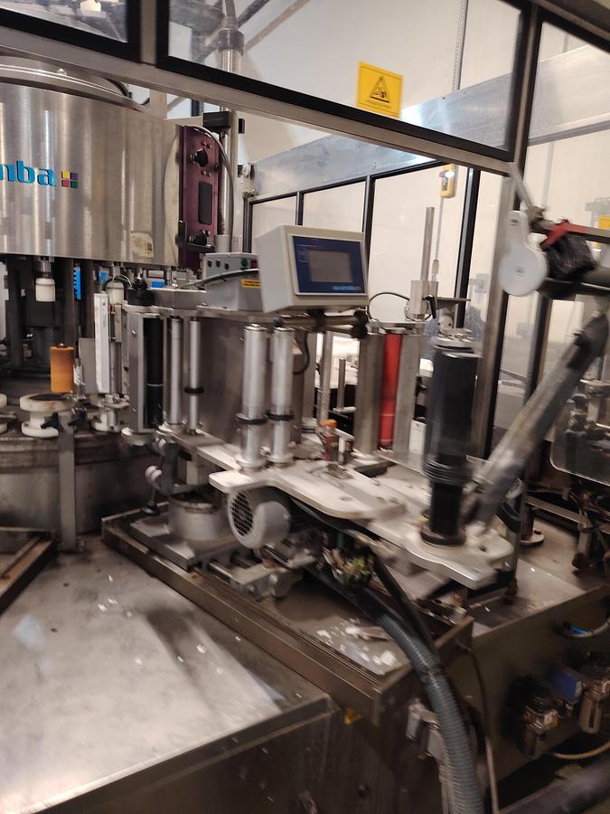 D'occasion Étiqueteuse automatique rotative Auxiemba SERVOTECH ROB 20-II-DR