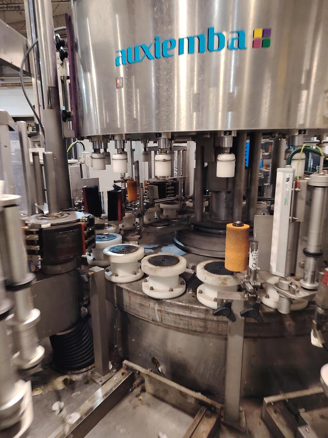 D'occasion Étiqueteuse automatique rotative Auxiemba SERVOTECH ROB 20-II-DR