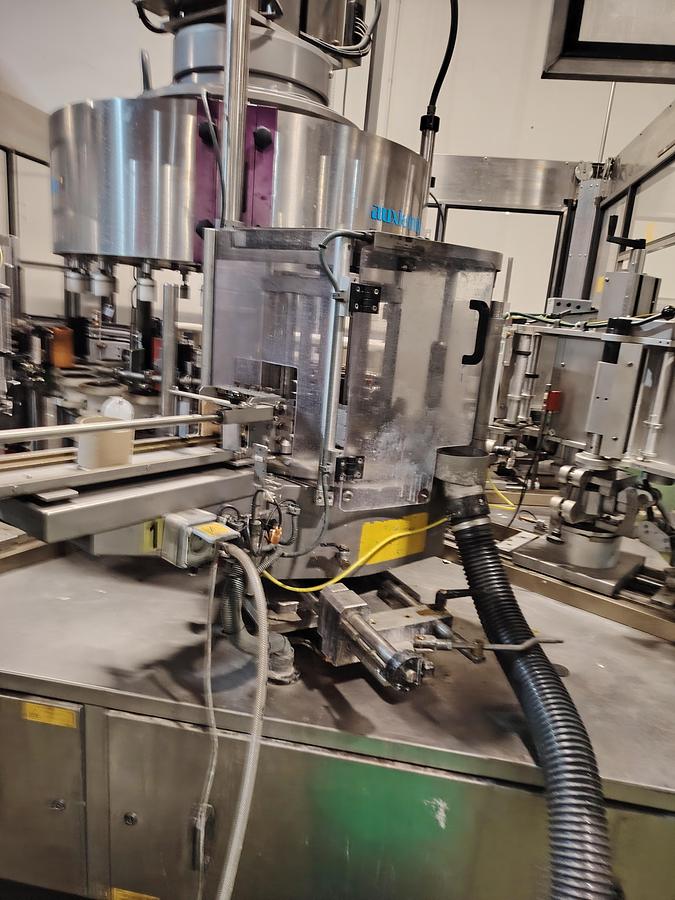 D'occasion Étiqueteuse automatique rotative Auxiemba SERVOTECH ROB 20-II-DR