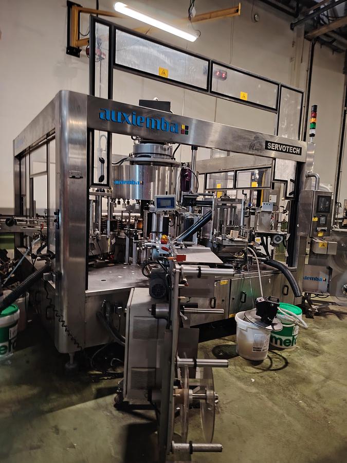 D'occasion Étiqueteuse automatique rotative Auxiemba SERVOTECH ROB 20-II-DR