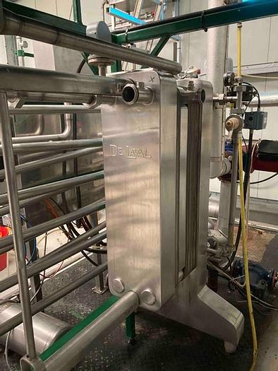 D'occasion COMPLETE FILLING AND CAPPING SYSTEM