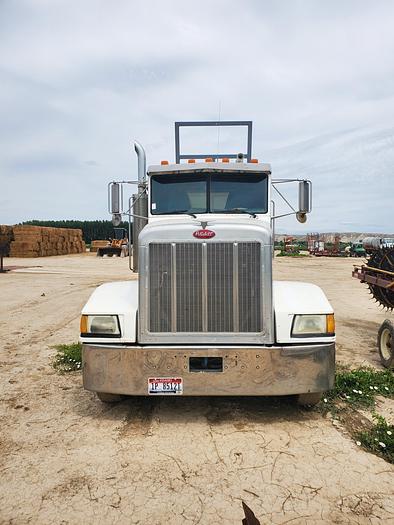 Used 1990 Peterbilt w/ New Holland 1051 Stack Retriever