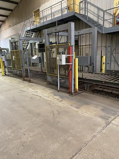 Used Rolling road where you place in two boxes stacked on top of each other, the machine destacks the two boxes. They then stop at the filling conveyor, once full they are stacked back on top of each other to be removed by a FLT
