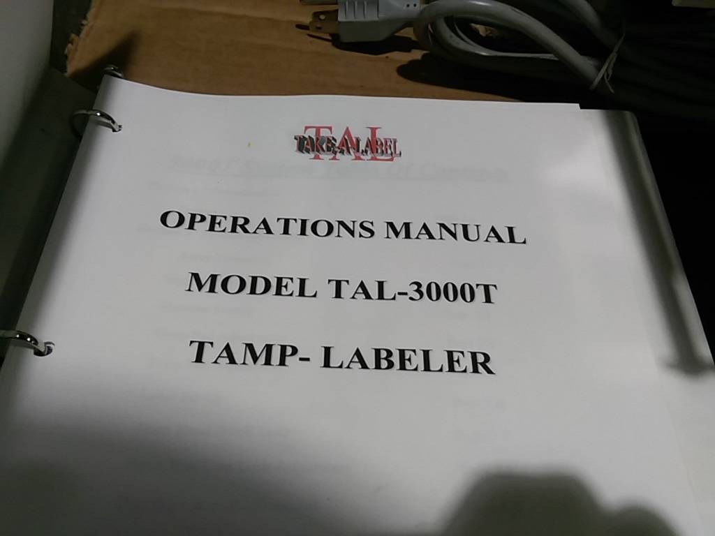 Used Take-a-Label Wipe On Labeler