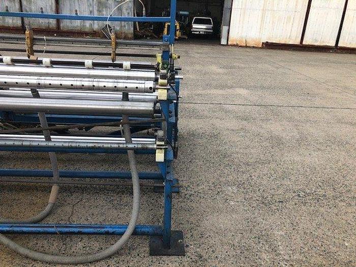 Used 66" R&K SEMI AUTO COUNTER ROLL SLITTER REWINDER