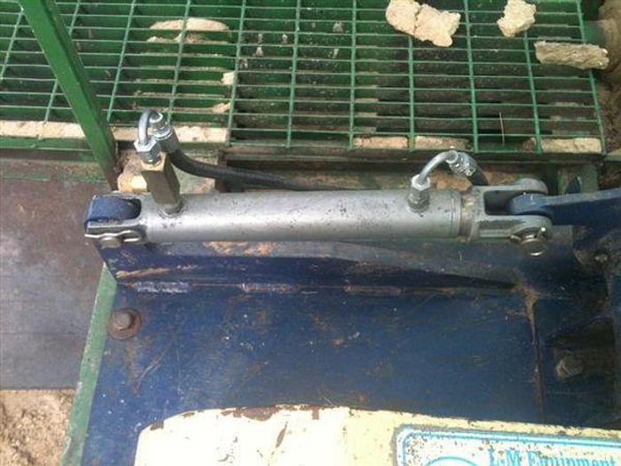 Used L-M  Deck Saw