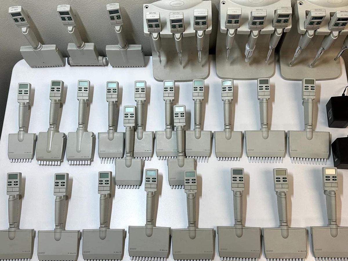 Used Lot of 32 Rainin EDP3-Plus Electronic Single Channel Pipettes – 1-10 µL, 10-100 µL, 100-1000 µL – With Charging Stand – As-Is