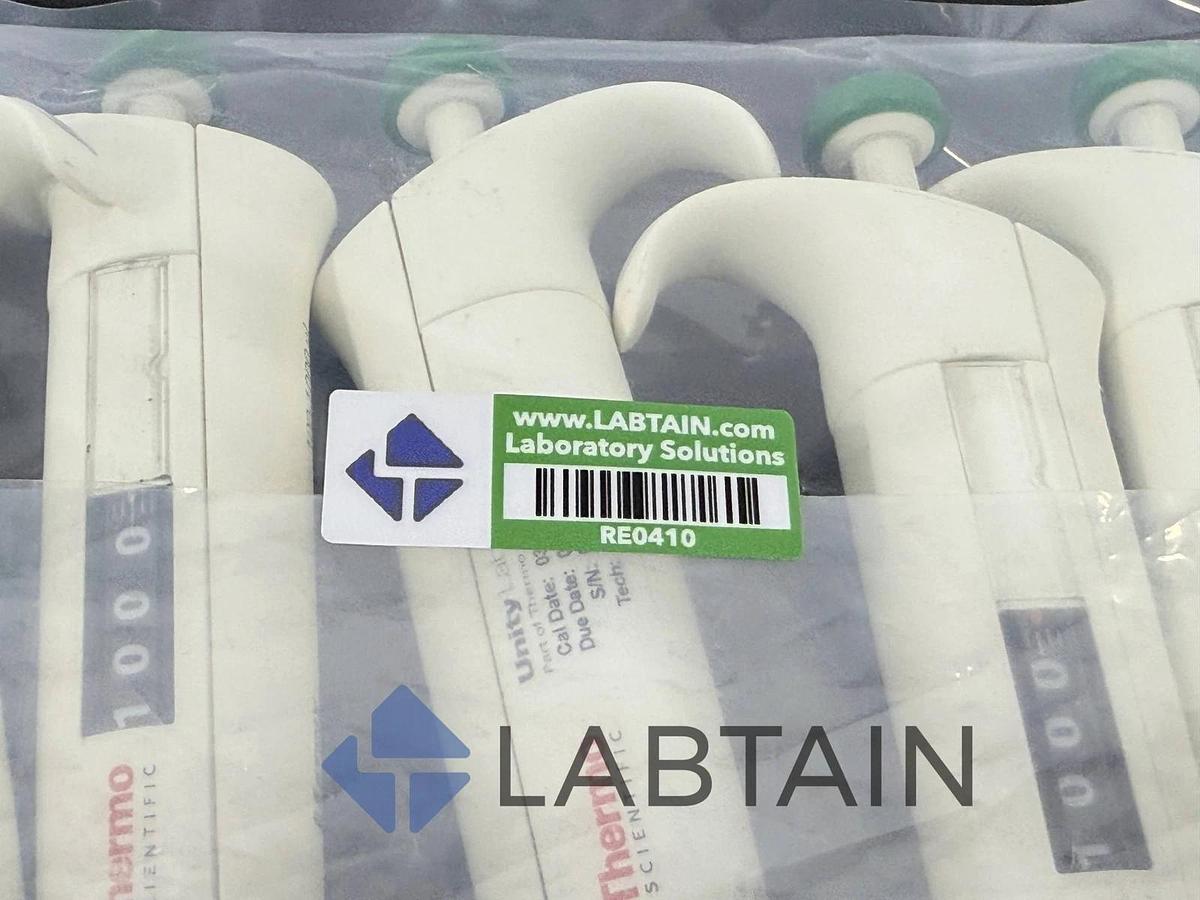 Used Thermo Scientific Matrix Adjustable Pipetts - 20-200ul (1) and 100-1000ul (4)