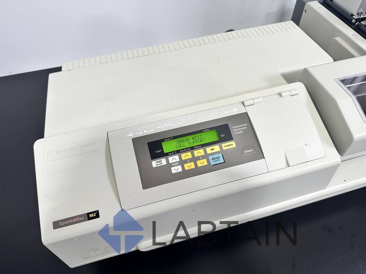 Used Molecular Devices SpectraMax M2e Microplate Reader – Fluorescence & Absorbance – w/ StakMax DE05102 – Tested – Issue 313