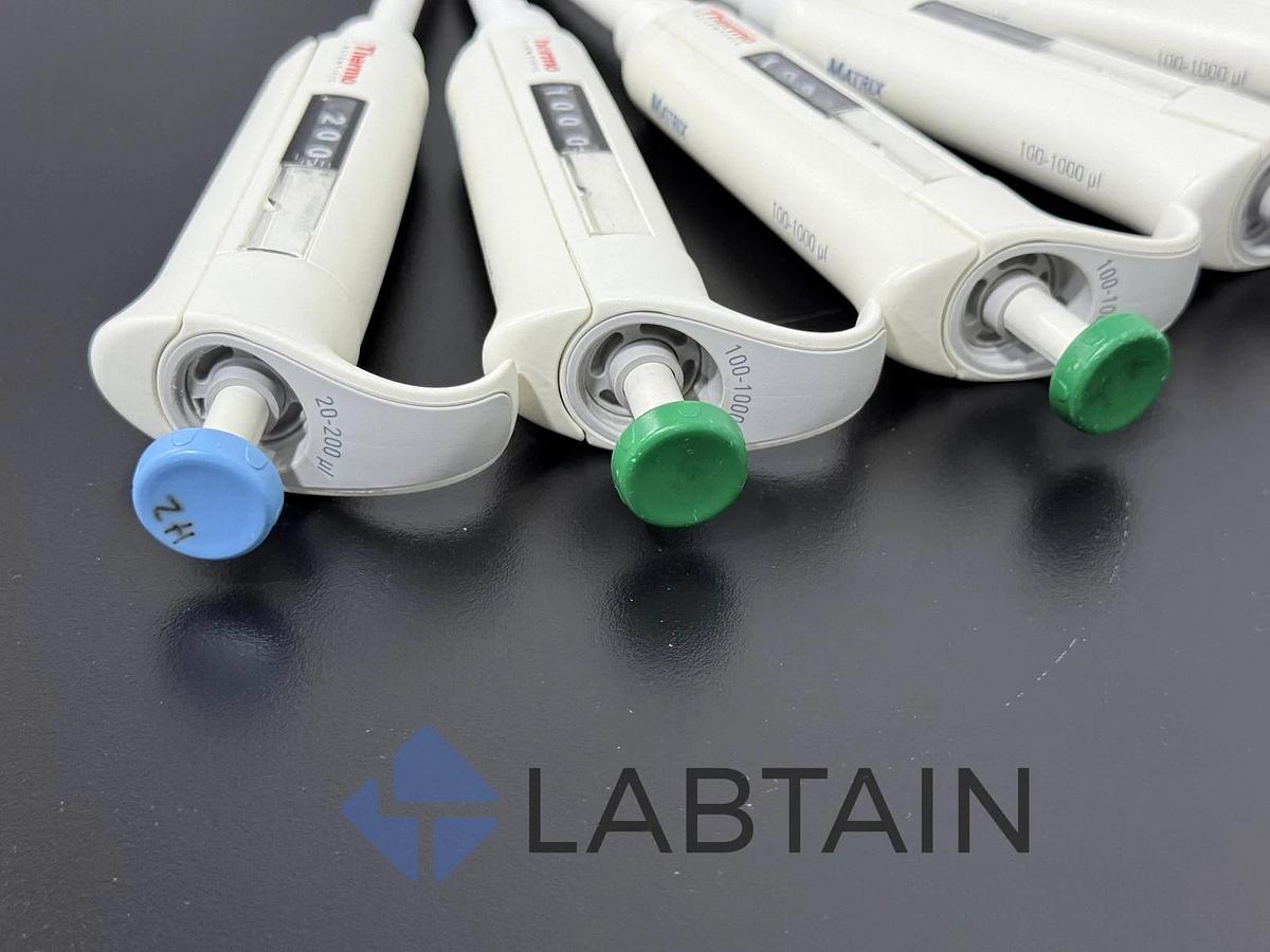Used Thermo Scientific Matrix Adjustable Pipetts - 20-200ul (1) and 100-1000ul (4)