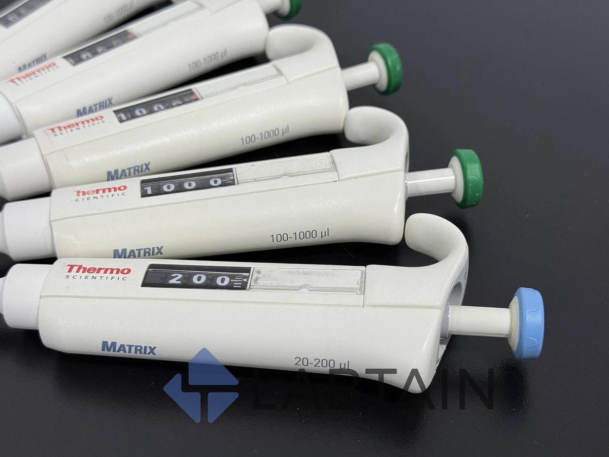 Used Thermo Scientific Matrix Adjustable Pipetts - 20-200ul (1) and 100-1000ul (4)