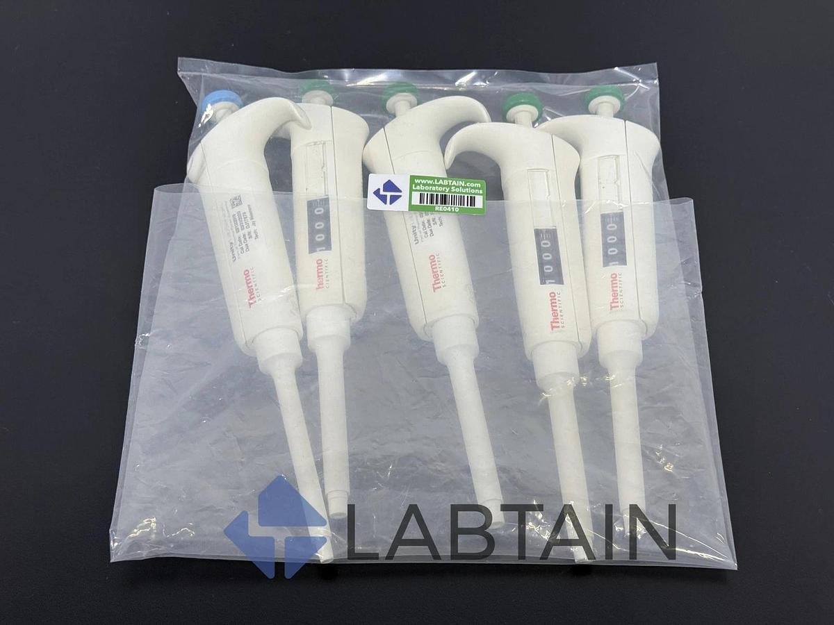 Used Thermo Scientific Matrix Adjustable Pipetts - 20-200ul (1) and 100-1000ul (4)