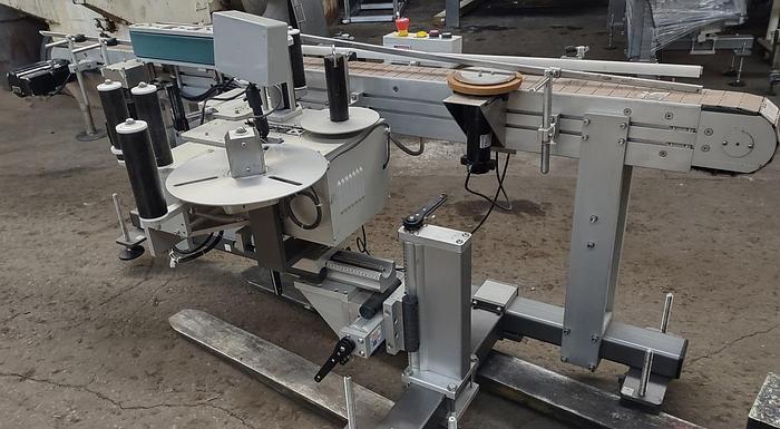 Used LSI model 1400 wrap pressure sensitive labeler