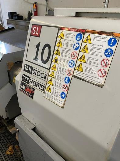 Used 2007 Haas CNC Lathe SL-10T & Servo Bar 300 Feeder