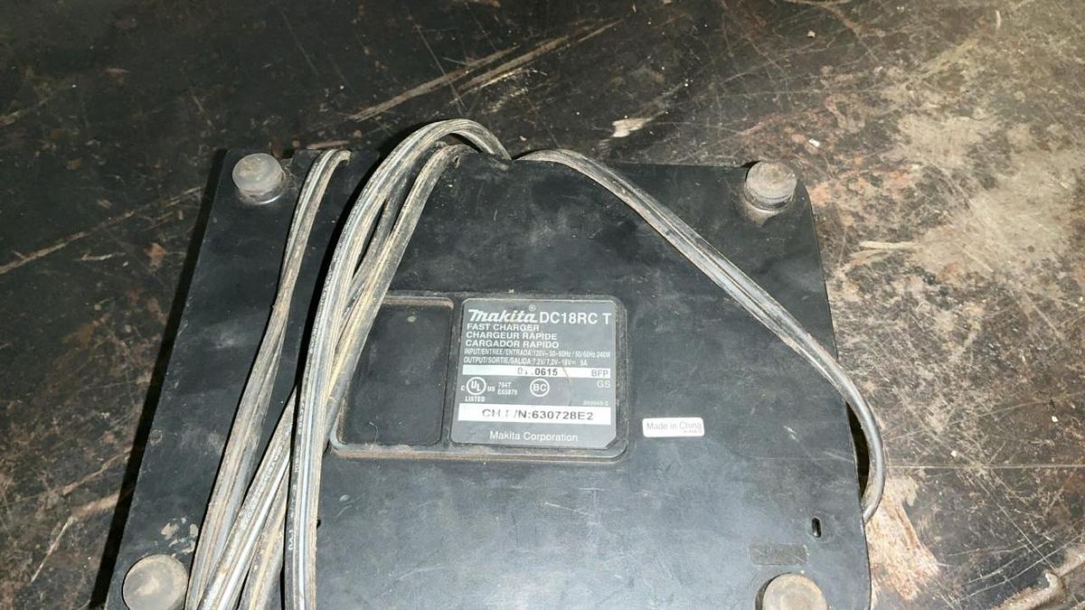 Used Makita Reciprocating Saw, Impact Driver, and Battery Charger