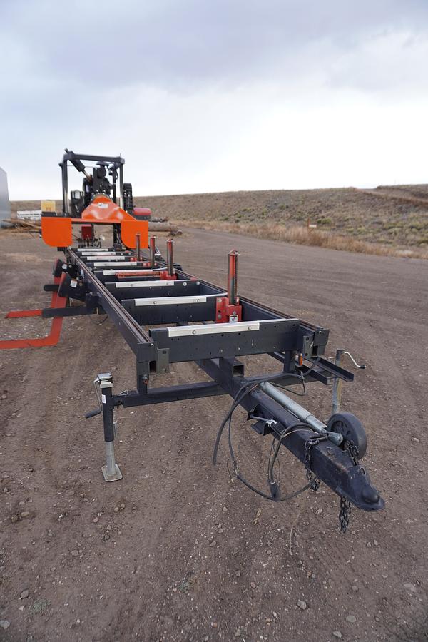 Used 2200 TIMBER KING bandmill/ with a Cat Claw band sharpener an tooth setter