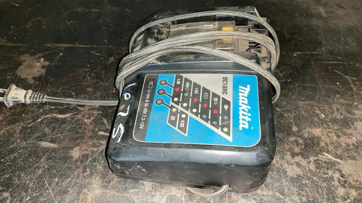 Used Makita Reciprocating Saw, Impact Driver, and Battery Charger