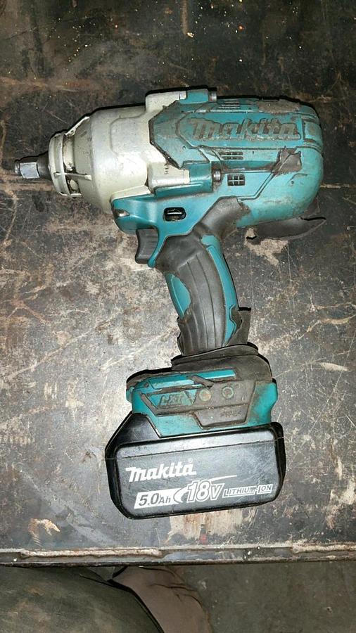Used Makita Reciprocating Saw, Impact Driver, and Battery Charger