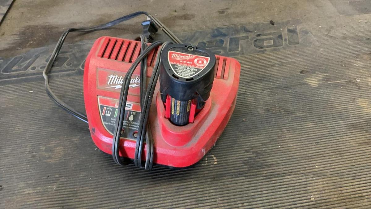 Used Milwaukee Impact and Reciprocating Saw Set