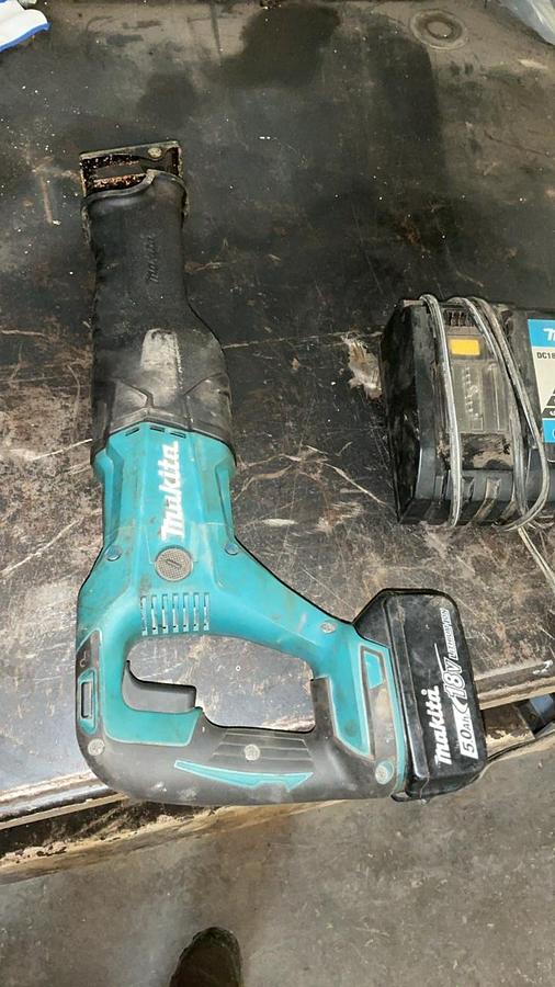Used Makita Reciprocating Saw, Impact Driver, and Battery Charger