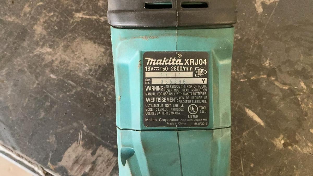 Used Makita Reciprocating Saw, Impact Driver, and Battery Charger